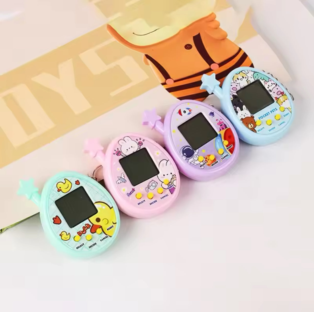 2Pcs Electronic Pet Machine Virtual Pet Raising Mini Handheld Game Console Random Color Keychain Toy